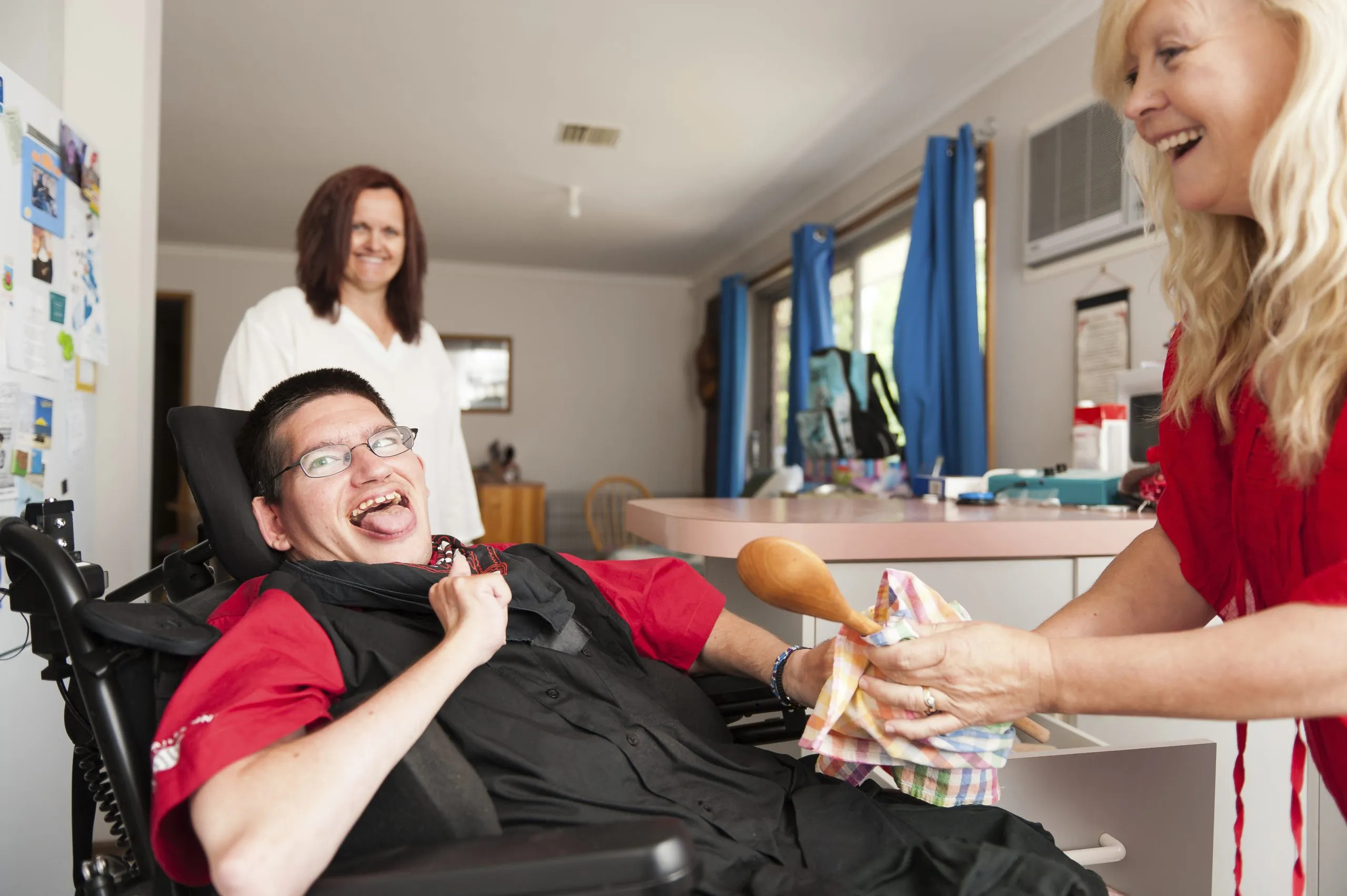 NDIS support worker helping participant in the community