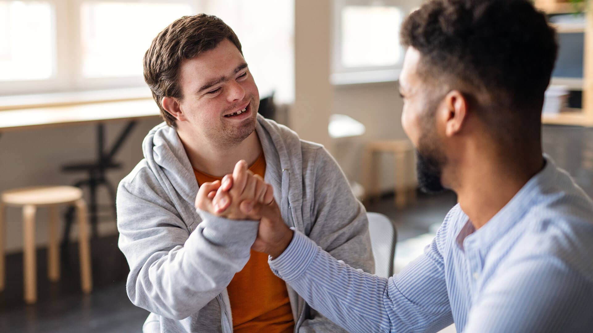 Caring NDIS support worker helping a participant in Sydney